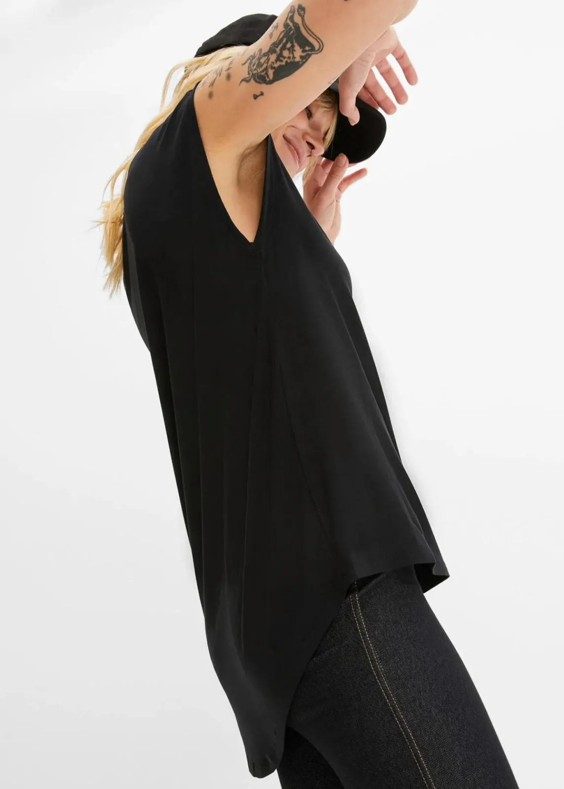 bonprix Shirts & Tops|Nachhaltigere Materialien^Vokuhila-Shirt aus fließendem Viskosemix schwarz