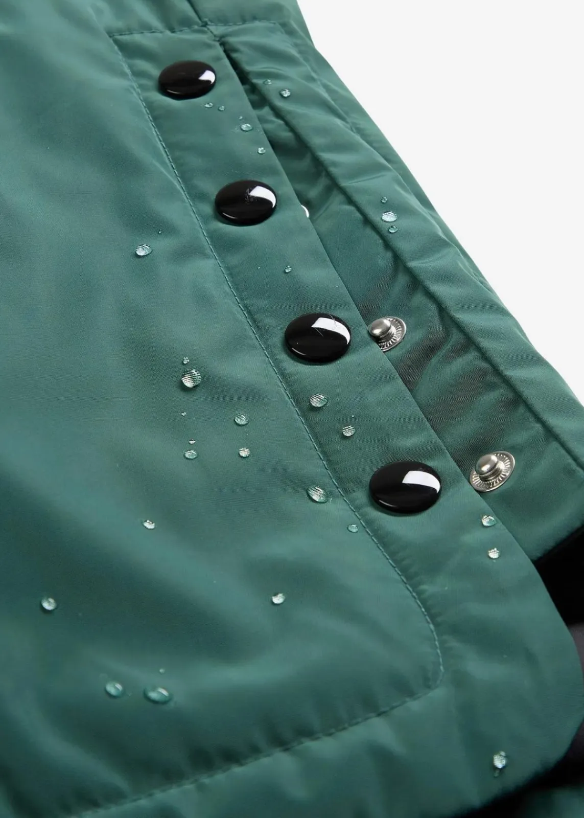 bonprix Nachhaltigere Materialien|Jacken & Mäntel^wasserdichter, wattierter Regenmantel in Midi-Länge mattgrün