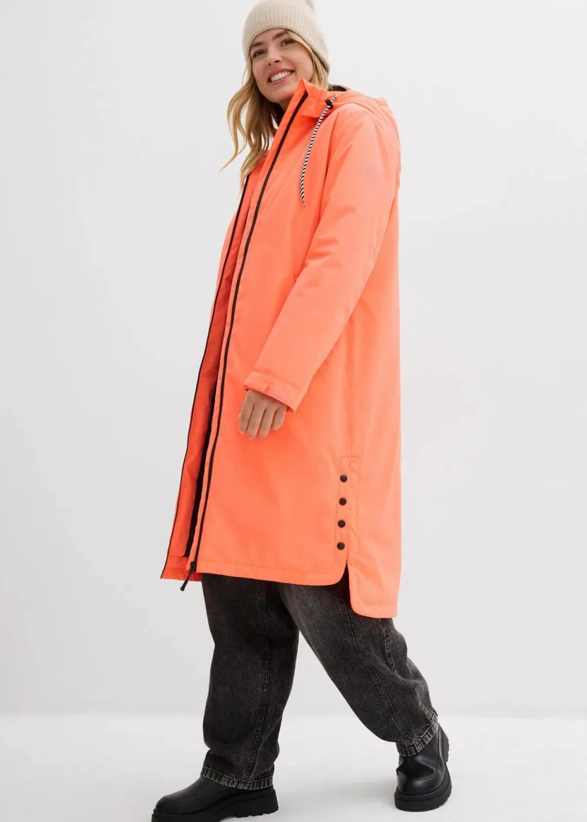bonprix Nachhaltigere Materialien|Jacken & Mäntel^wasserdichter, wattierter Regenmantel in Midi-Länge neonorange/schwarz