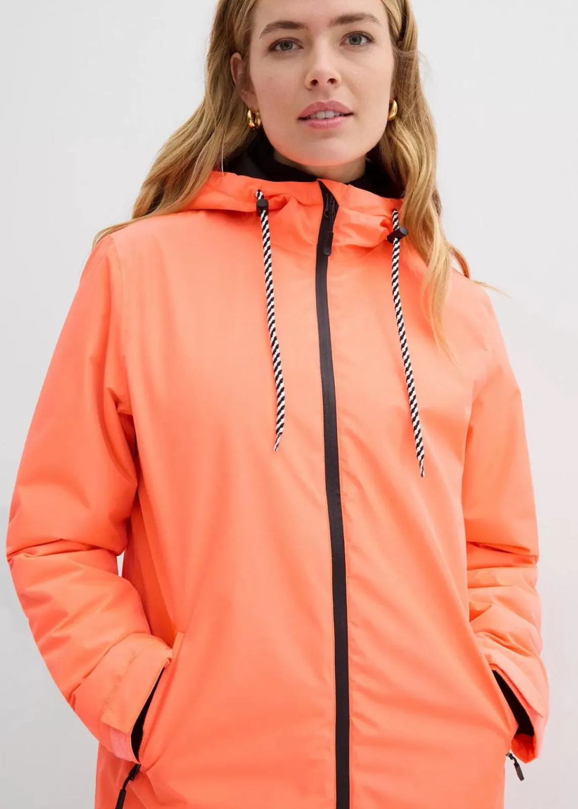 bonprix Nachhaltigere Materialien|Jacken & Mäntel^wasserdichter, wattierter Regenmantel in Midi-Länge neonorange/schwarz