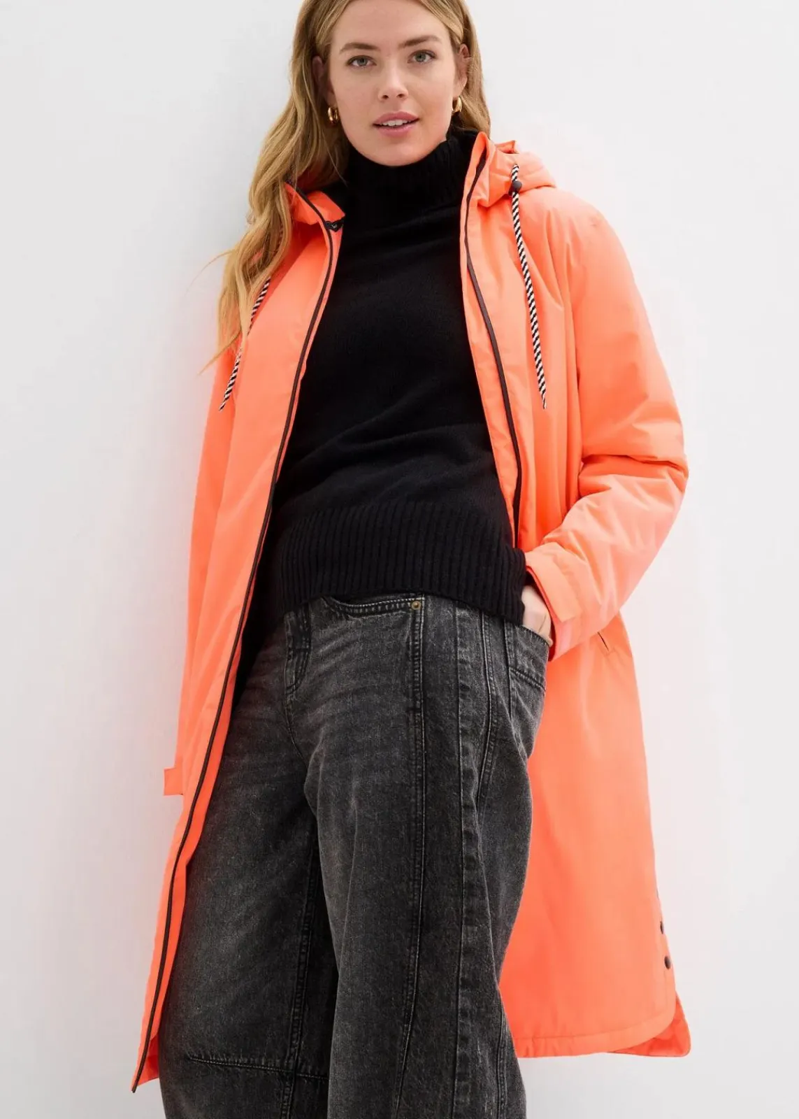 bonprix Nachhaltigere Materialien|Jacken & Mäntel^wasserdichter, wattierter Regenmantel in Midi-Länge neonorange/schwarz