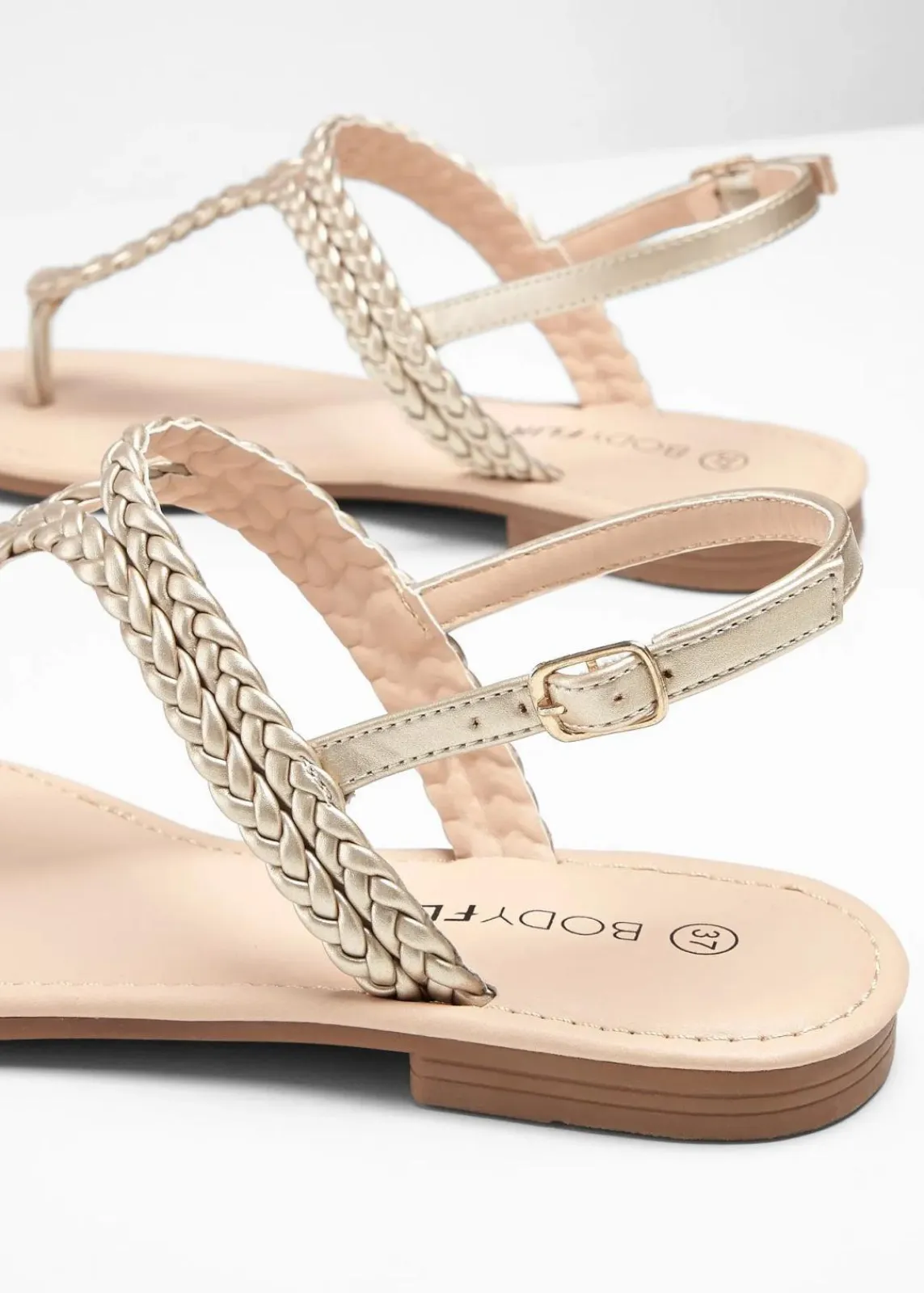 bonprix Strandmode|Sommerschuhe^Zehenstegsandalen in Flecht-Optik gold
