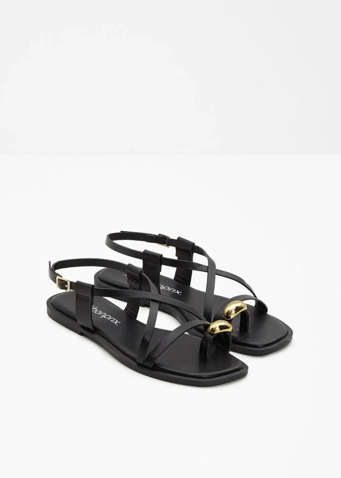 bonprix Sommerschuhe^Zehenstegsandalen mit Metallic-Detail schwarz